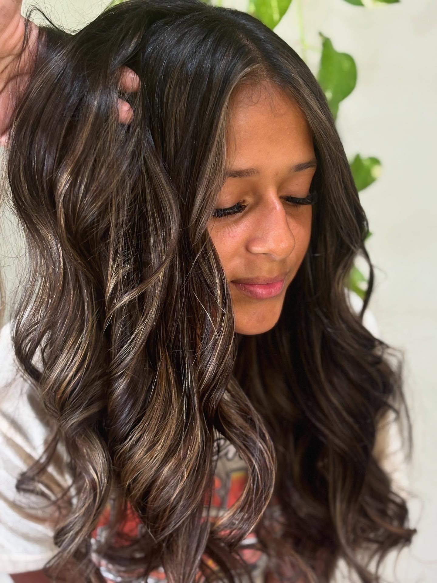 Brunette face framing waves